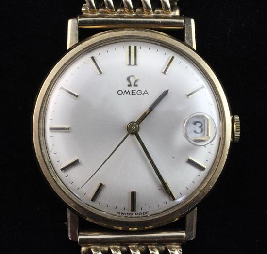 A gentlemans 1960s 9ct gold Omega manual wind wrist watch,